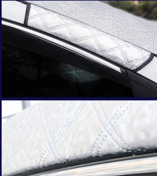 Car window sunshade with quilted design on a car window