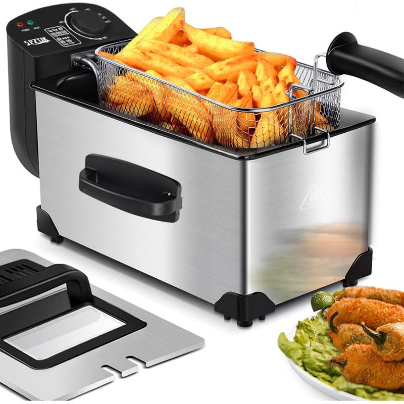 Deep fryer with basket of french fries and a plate of fried food on a white background