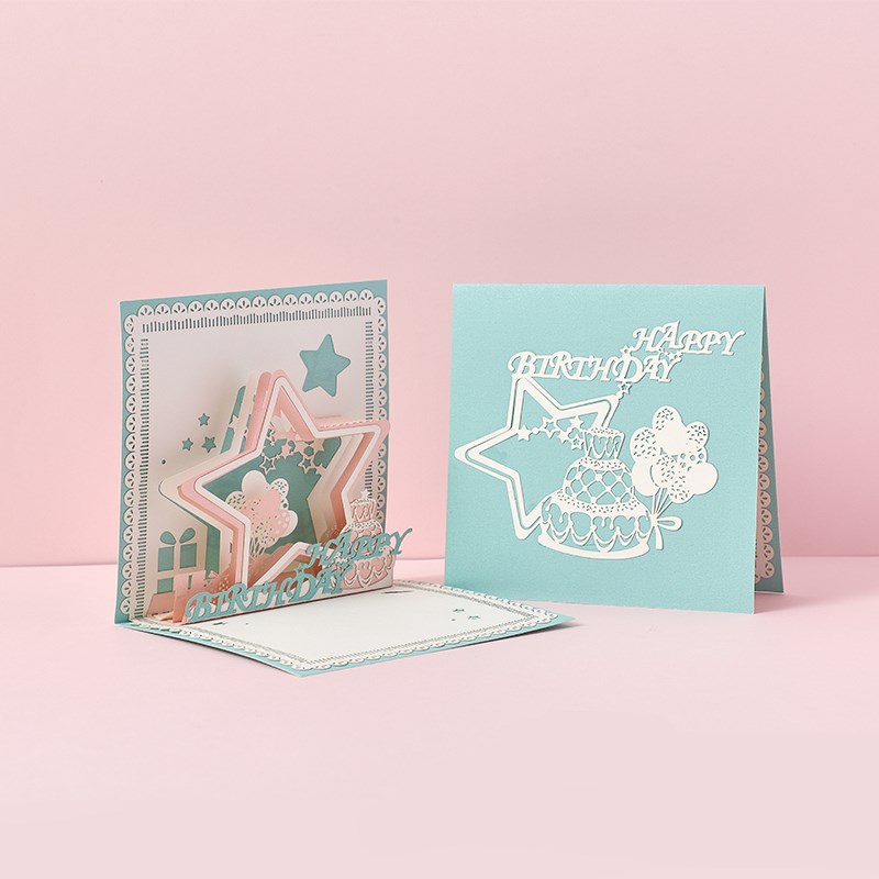 Two birthday cards with star designs on a pink background