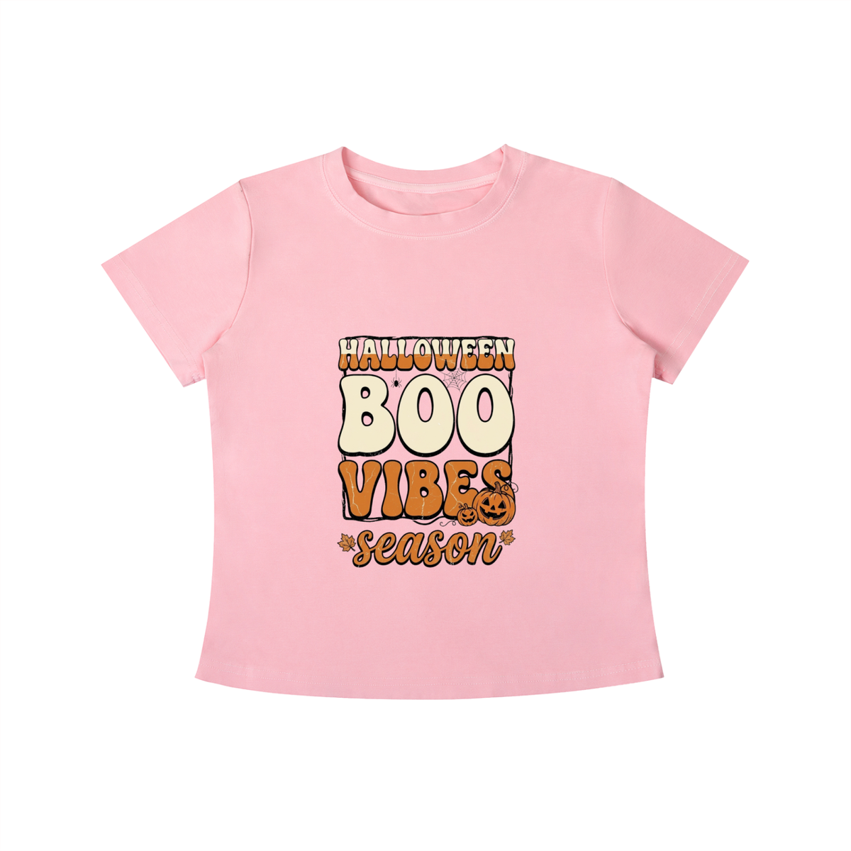 A light pink short-sleeve t-shirt with a 'HALLOWEEN BOO VIBES season' graphic printed on the front, displayed against a solid white background.