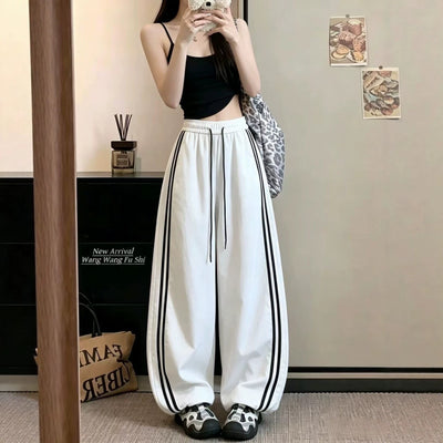 High-waisted Loose-fitting Ankle-tied Striped Pants
