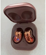 Rose gold wireless earbuds in a matching case on a light gray background