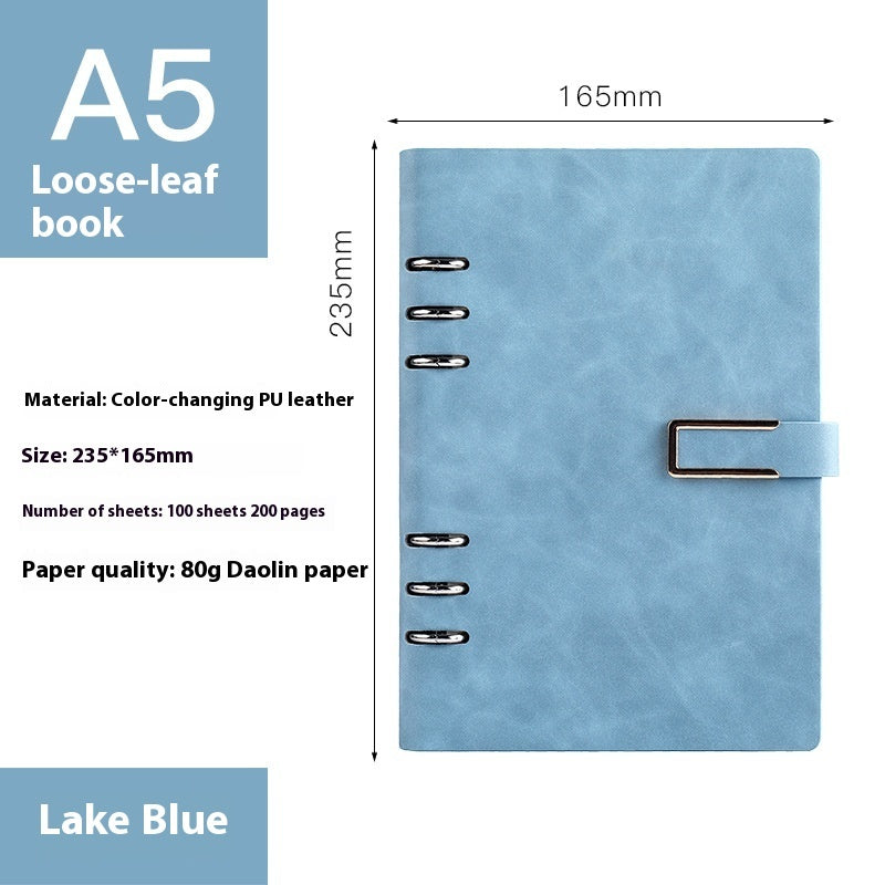 Lake blue loose-leaf book with dimensions and material details on a white background