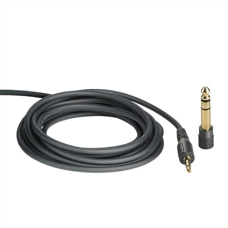 Coiled audio cable with 3.5mm plug on a white background