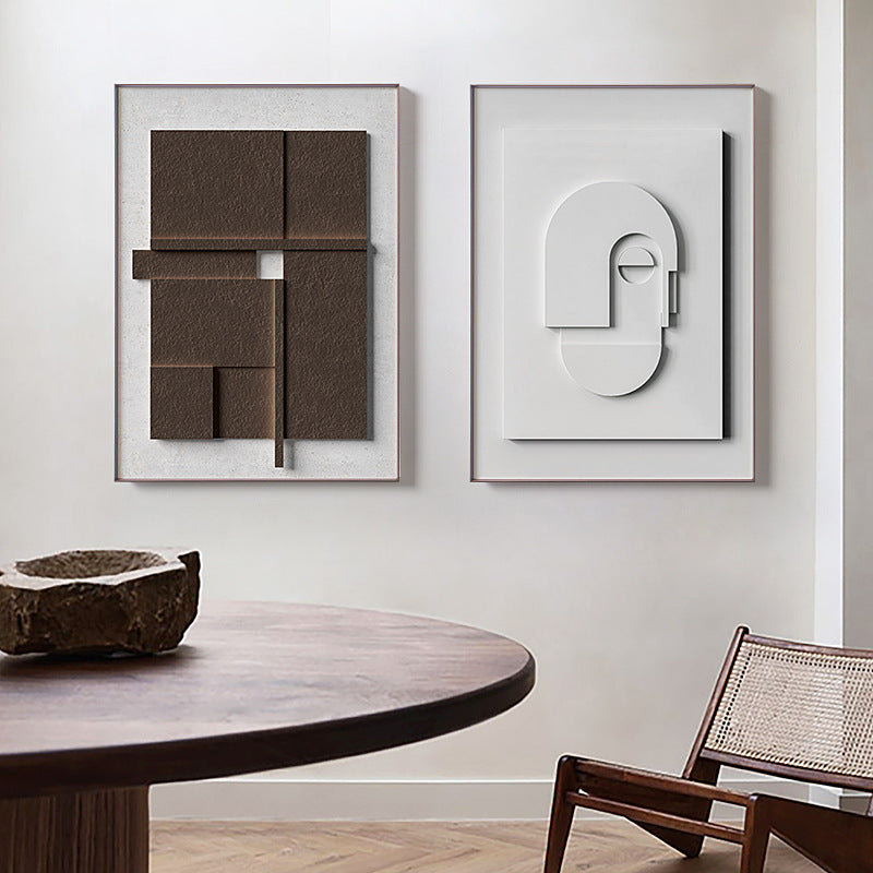 Modern interior with abstract wall art and a wooden table.