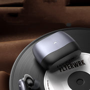 Wireless earbuds on a vinyl record with 'UGREEN FLYERWRK' branding.