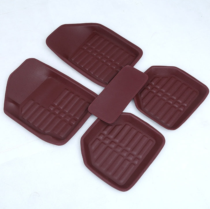 Set of brown car floor mats on a white background