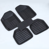Black heavy-duty rubber car mats with deep channels for trapping dirt, mud, and water in vehicle footwells