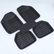Black heavy-duty rubber car mats with deep channels for trapping dirt, mud, and water in vehicle footwells