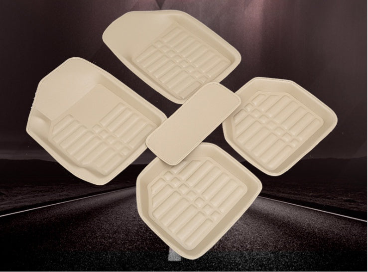 Black heavy-duty rubber car mats with deep channels for trapping dirt, mud, and water in vehicle footwells