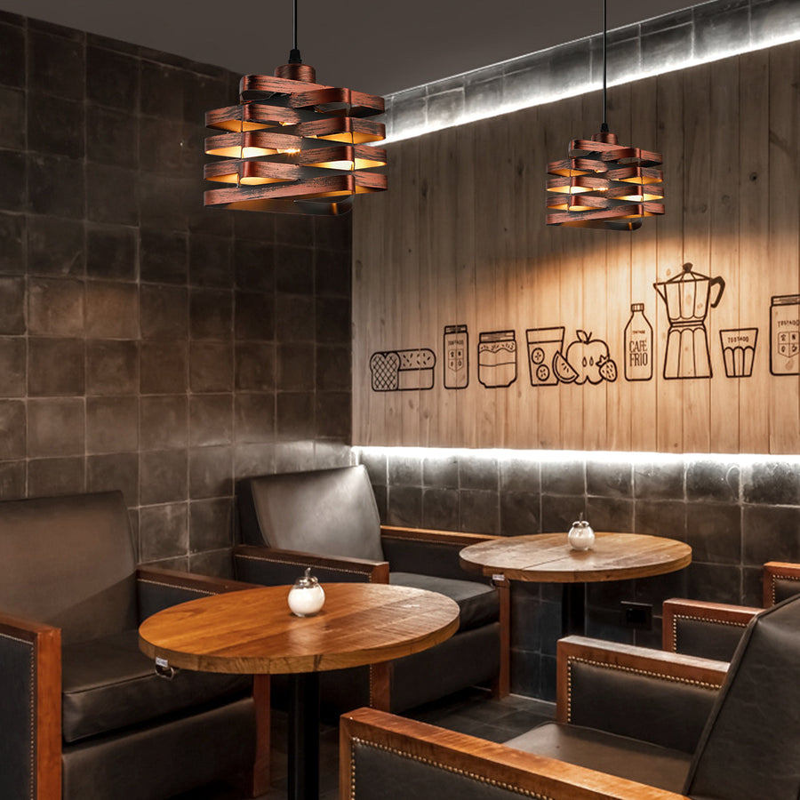 Cozy restaurant interior with wooden tables, chairs, and decorative wall art.