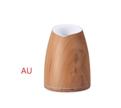 Wooden diffuser with white top on a white background