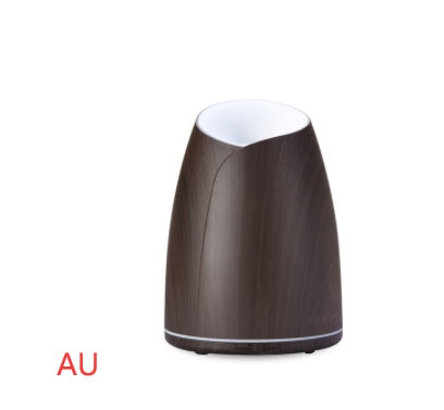 Wooden diffuser with white top on a white background
