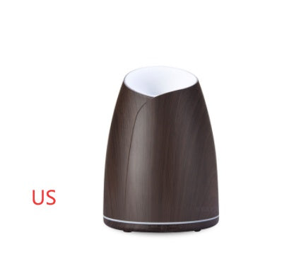 Wooden diffuser with white top on a white background, labeled 'US'.