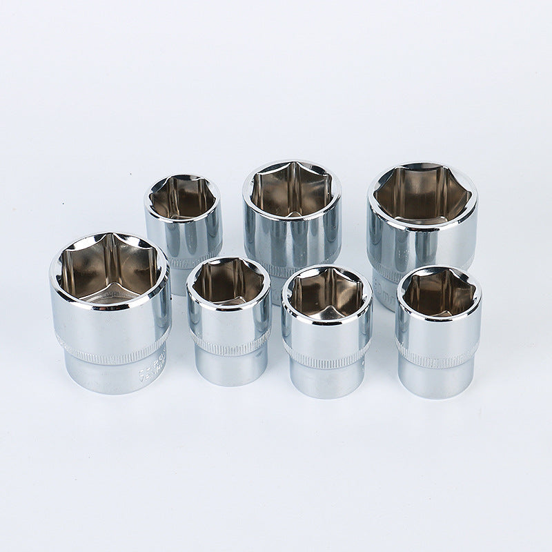 Set of seven metallic sockets on a white background