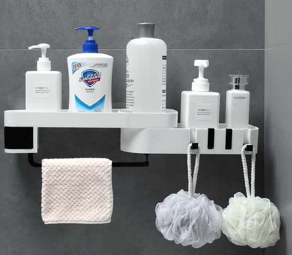 Bathroom shelf with various toiletries and bath products on a gray wall.