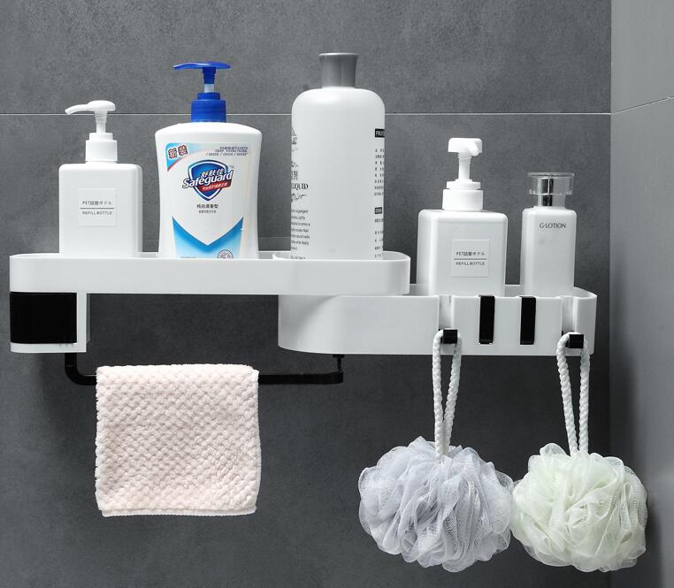 Bathroom shelf with various toiletries and bath products on a gray wall.