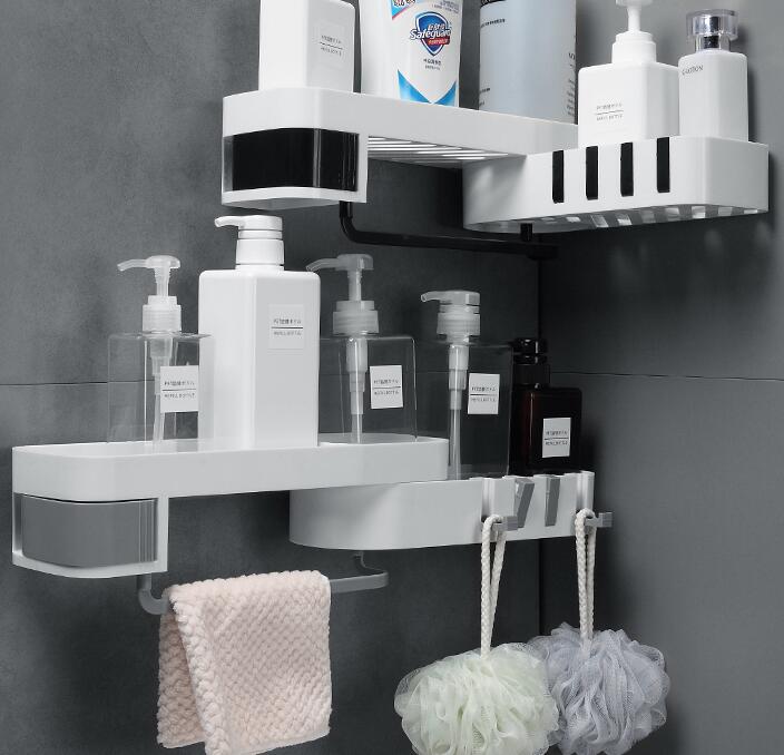 Bathroom shelves with toiletries on a gray tiled wall