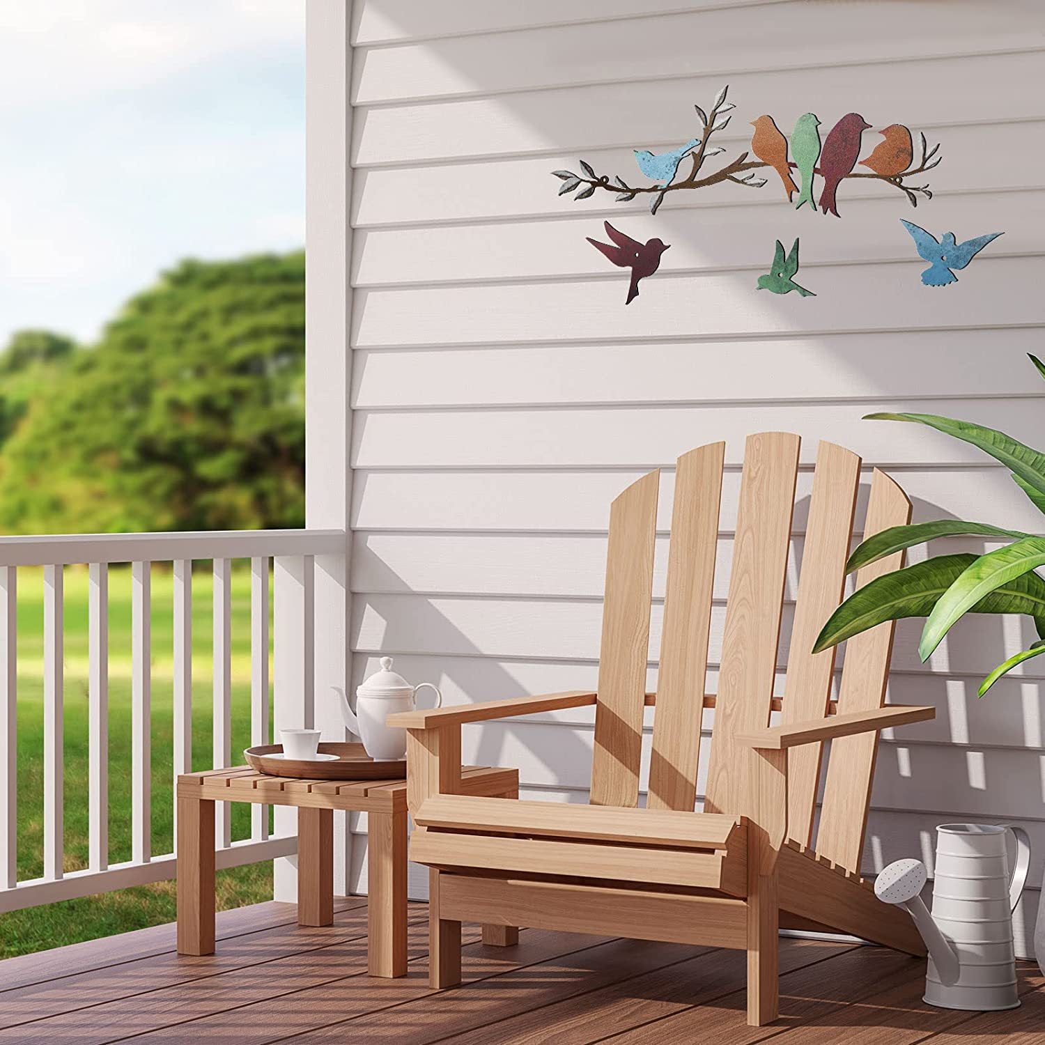 Wooden chair on a porch with decorative birds on the wall