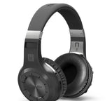 Black headphones with brand logo on a white background