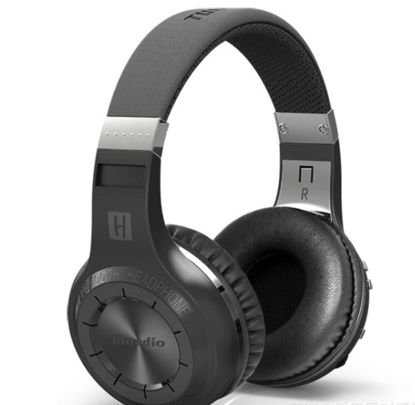 Black headphones with silver accents on a white background