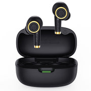 Black wireless earbuds with gold accents in a charging case on a white background