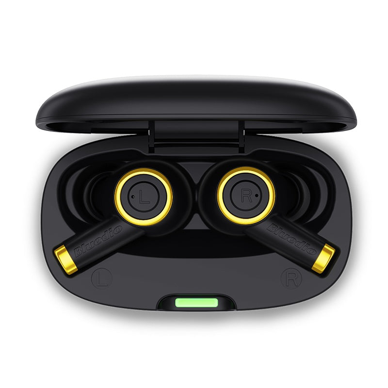 Black and yellow wireless earbuds in a charging case on a white background