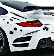 White car with bullet hole decals on a black background