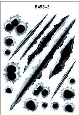 Set of black and white scratch and bullet hole decals on a white background