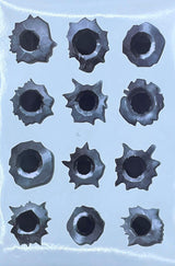 Sticker with bullet hole designs on a clear background