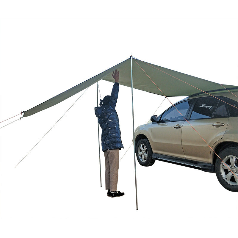 Person setting up a car canopy over a vehicle on a white background