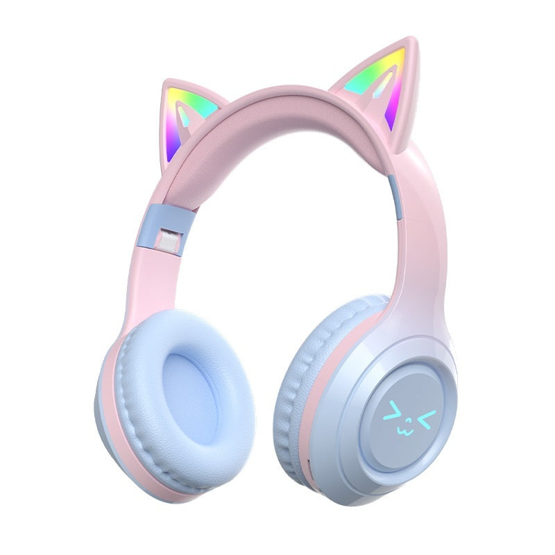 Pink and blue headphones with cat ear design on a white background