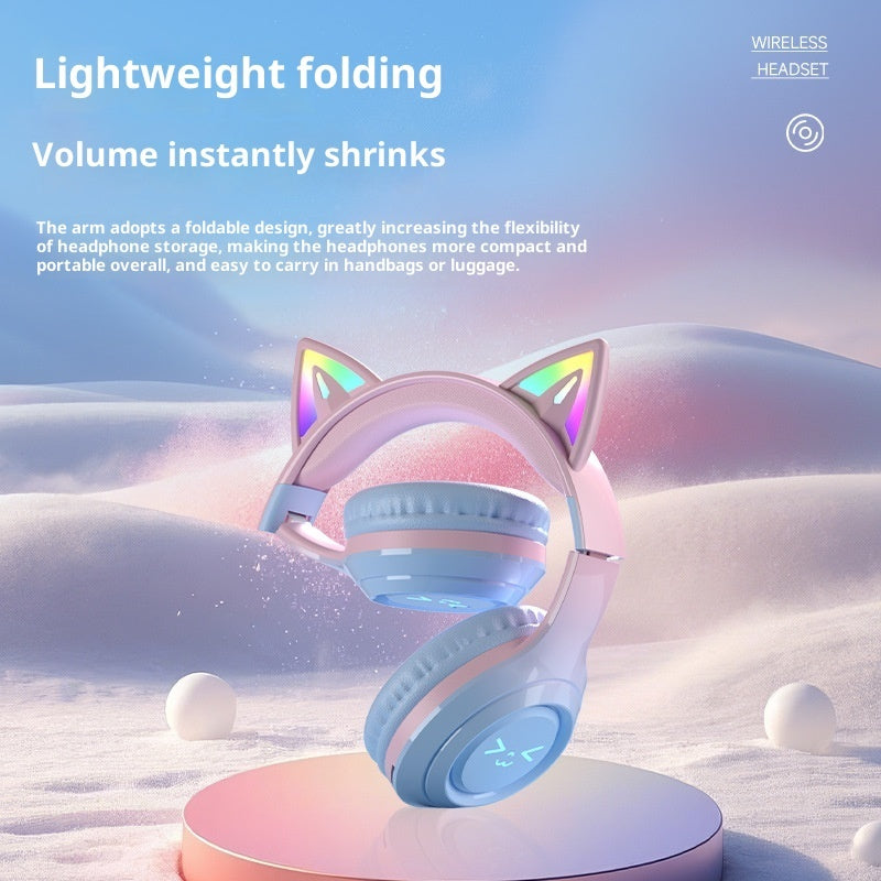 Wireless headphones with cat ear design on a snowy landscape background