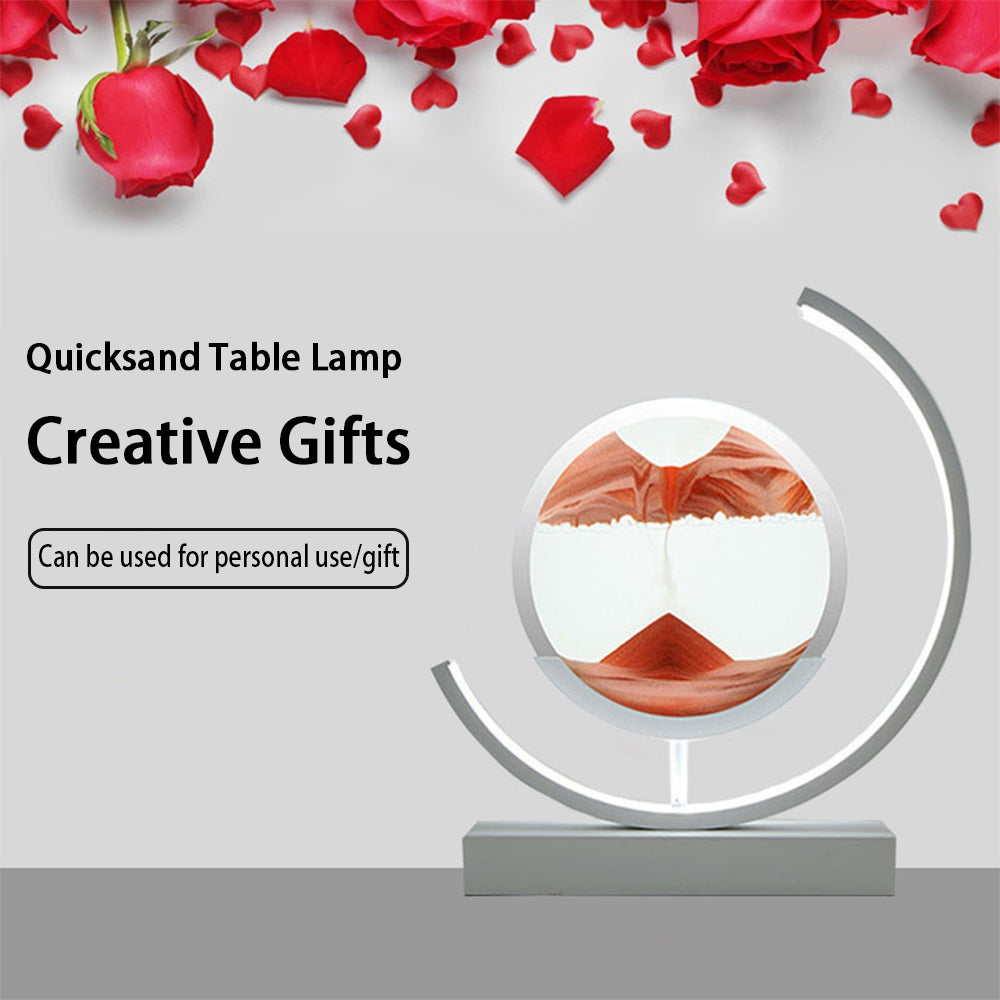 Quicksand table lamp with red rose petals and heart shapes on a white background