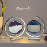 Two decorative items with circular designs on a shelf, featuring the brand 'Simple Art'.