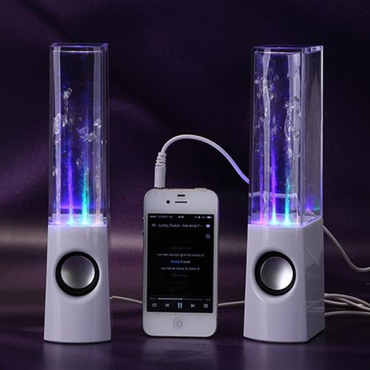 Two water fountain speakers with LED lights and a smartphone connecting them on a dark background.