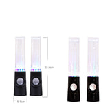 Black water fountain speakers with LED lights and measurements on a white background