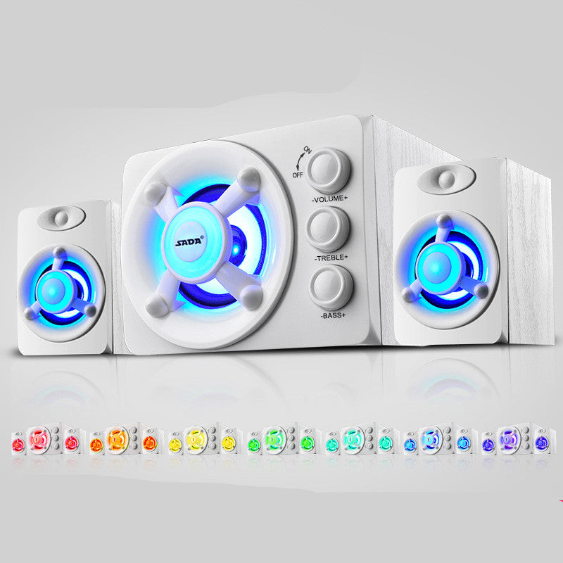 White audio system with blue LED lights on a gray background
