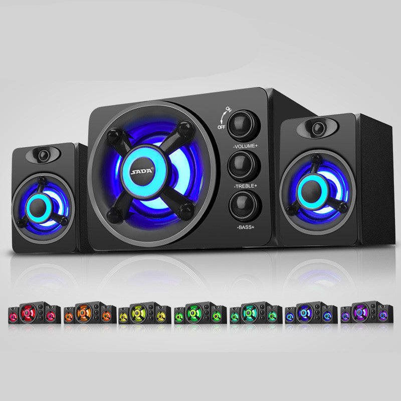 Black speaker system with RGB lighting on a gray background