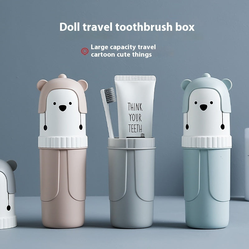 Doll travel toothbrush box with cartoon bear design on a gray background