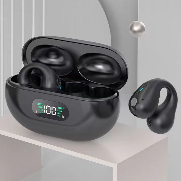Black wireless earbuds with charging case on a light gray background