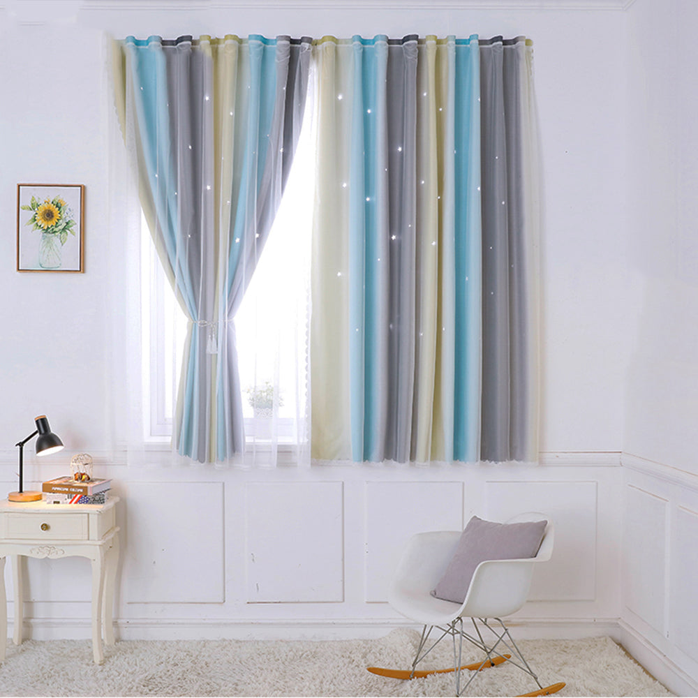 Striped curtains in a room with a chair and table.