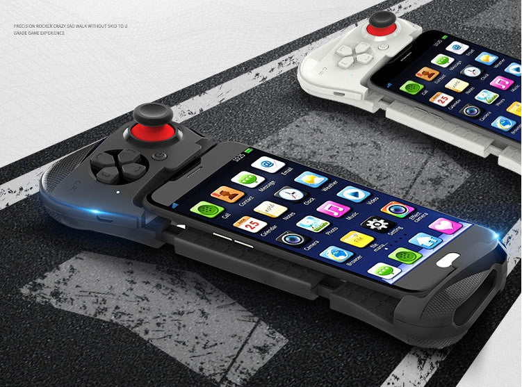 Phone with game controller attachment on a textured surface
