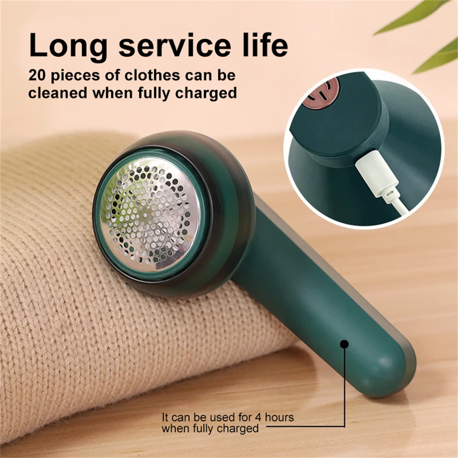 Green fabric shaver with charging cable on a beige fabric background, highlighting its long service life and charging capabilities.