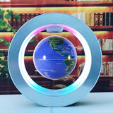 Levitating globe with LED light on a table in front of a bookshelf