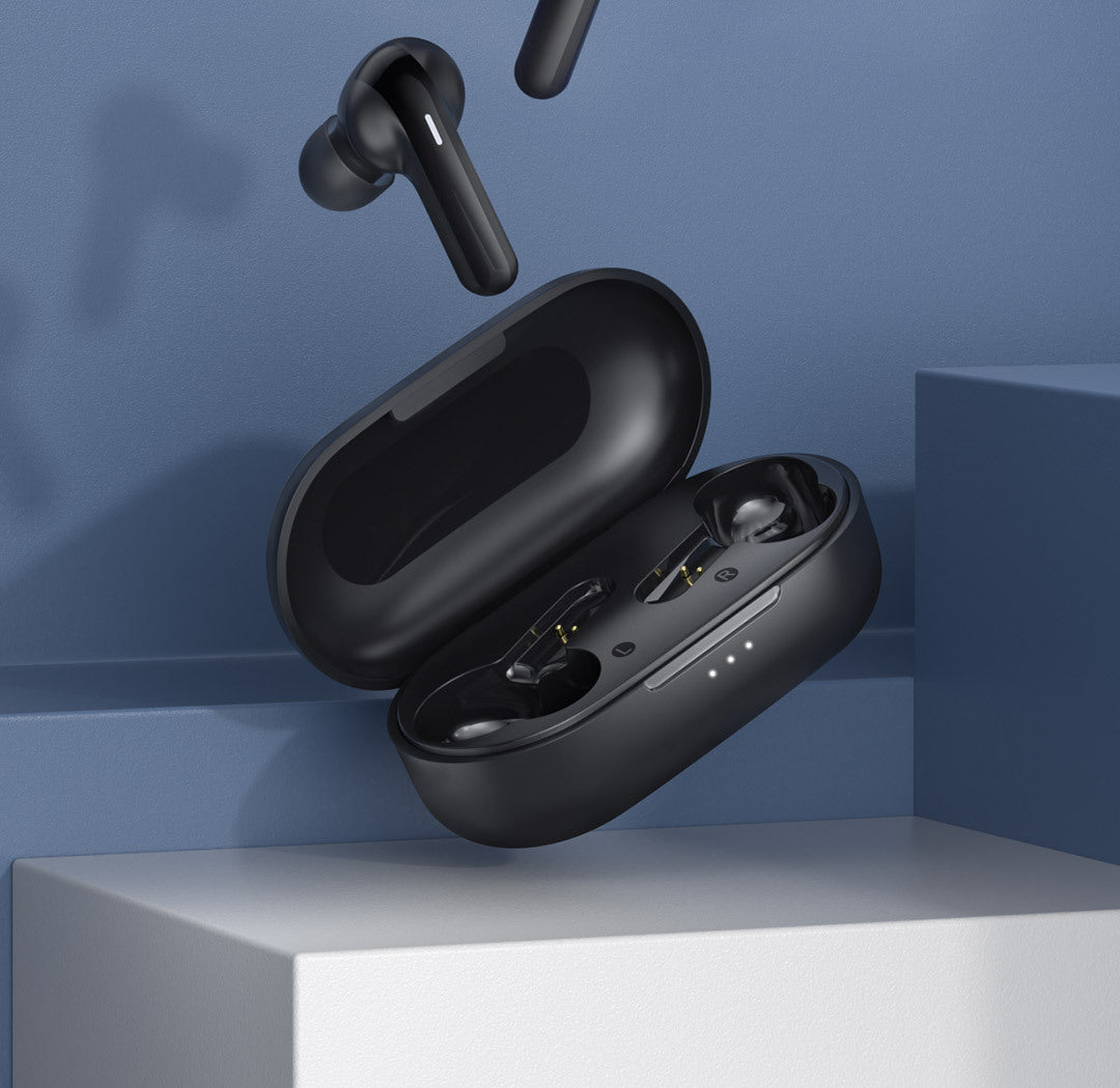Black wireless earbuds in an open case on a blue background