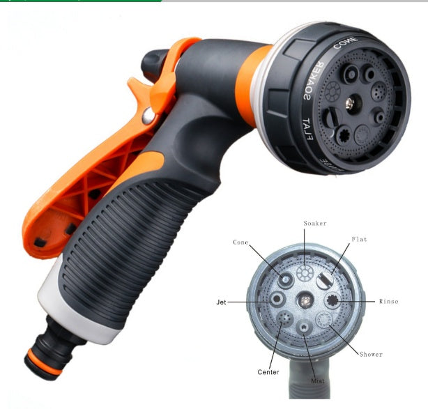Garden hose nozzle with orange and black handle on a white background