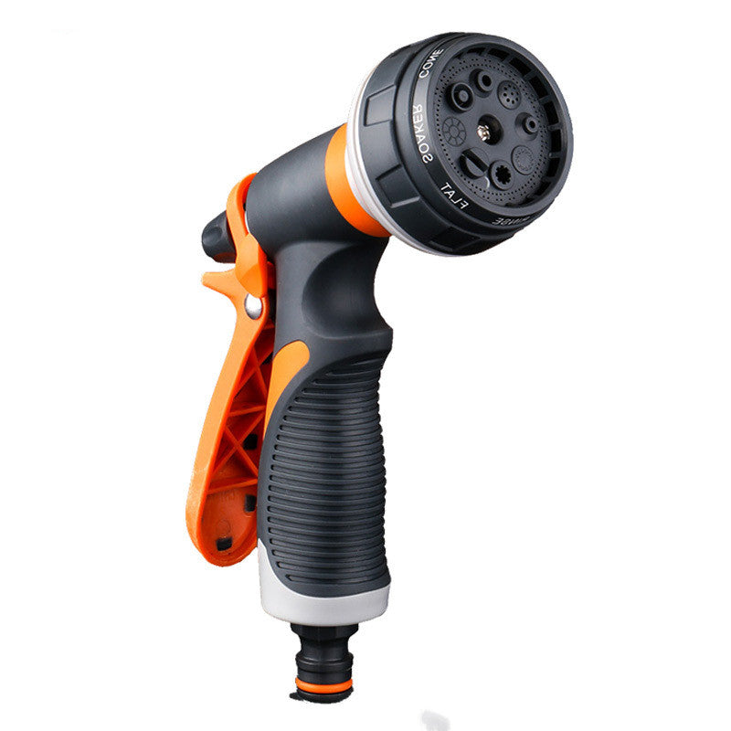 Gardening spray gun with black and orange design on a white background