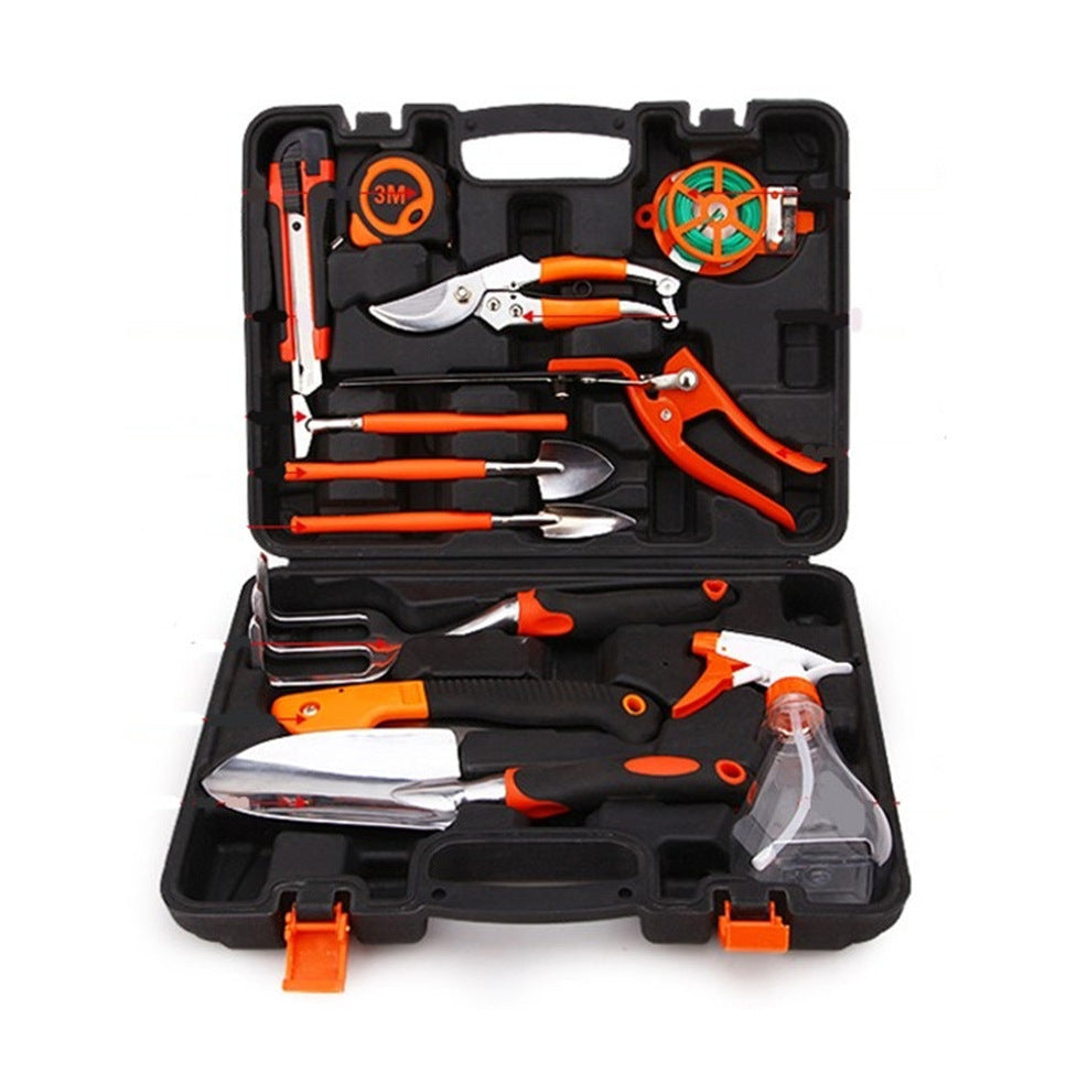 Set of gardening tools in a black case with orange accents on a white background