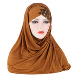 parkling solid color glitter jersey hijab for women, styled as a turban and headband for formal Muslim fashion